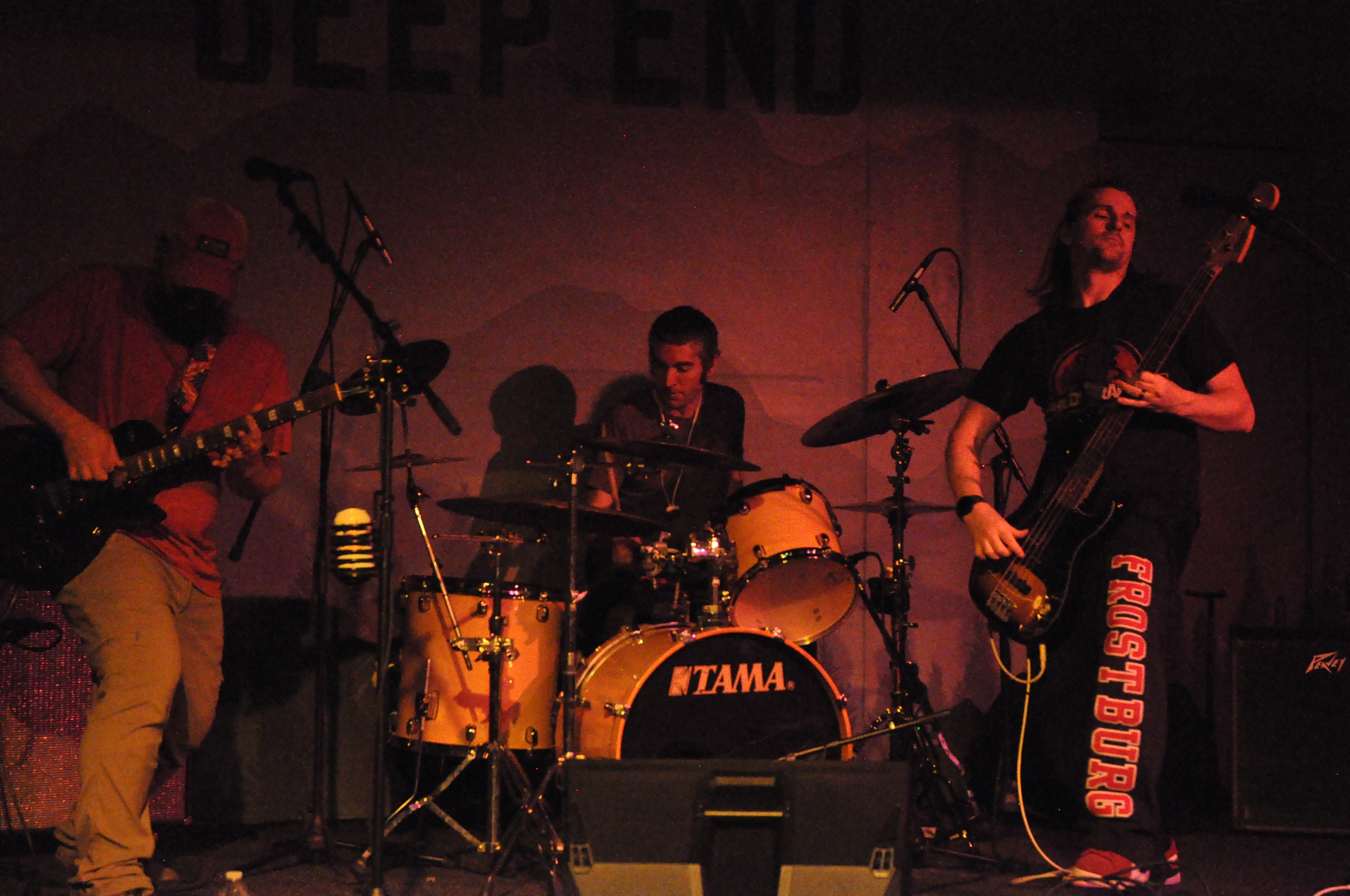 Arm The Track playing together on stage